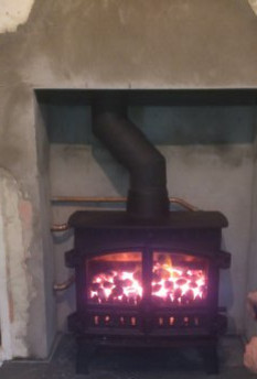 Plastered fireplace North Devon Builder